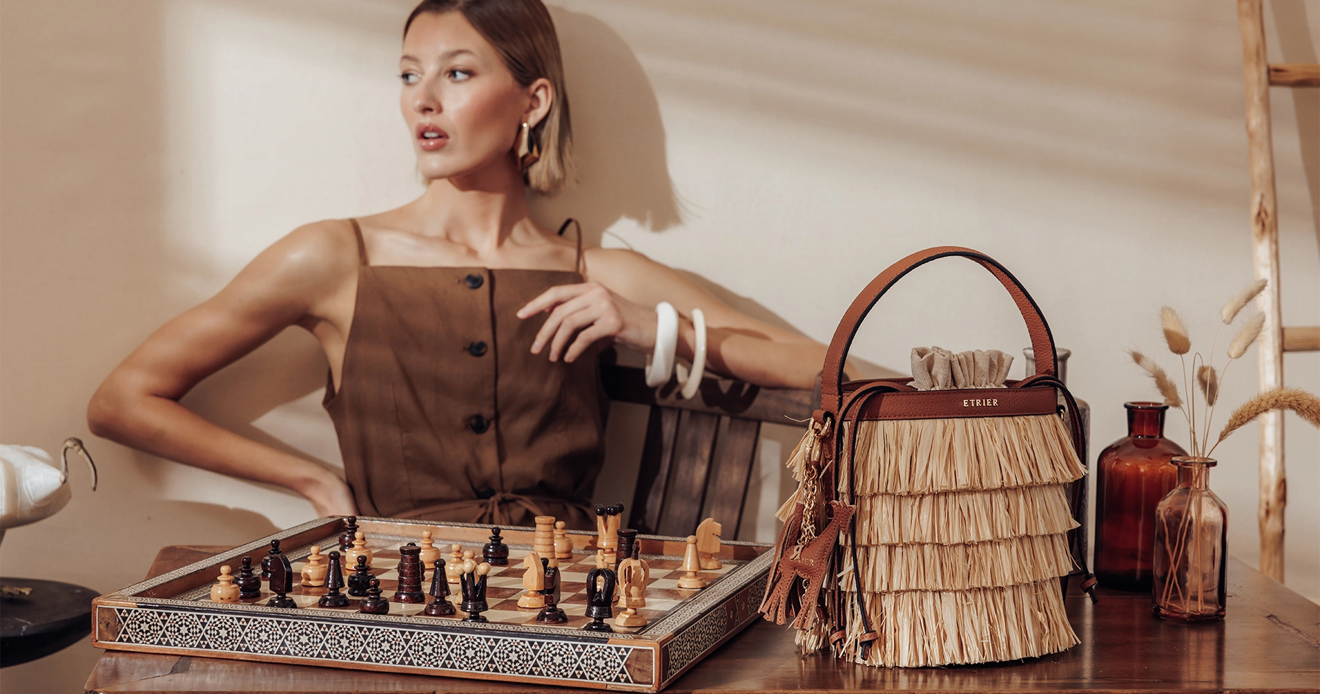 King raffia bag with fringe — Safari Reporter Etrier lookbook vibe